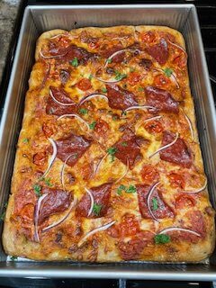 Focaccia with pepperoni and onions